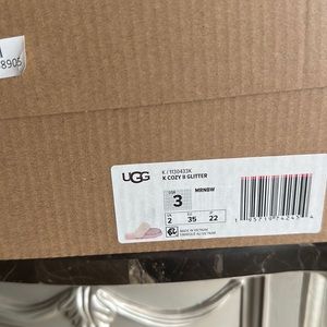 Brand new. Never worn Ugg Slippers size 3